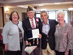 photo, The Congressman presents WWII veteran Joe Brown with his long awaited medals of honor from his service in WWII on the 60th Anniversary of D-Day.