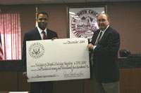 Congressman Jackson presenting check for $295,500 to Mayor David Owen