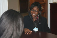 Jessica Anderson (from Lake Forest Academy) speaking with DeBorah Posey (from the staff of Congressman Jesse Jackson, Jr.)