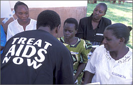 A health worker counselling women about HIV/AIDS treatment.