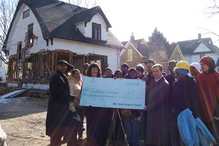 February 14, 2006 Congressman Kirk presents a ceremonial check from HUD for $700,000 for Youthbuild Lake County, a program that helps at-risk kids in Waukegan and North Chicago.