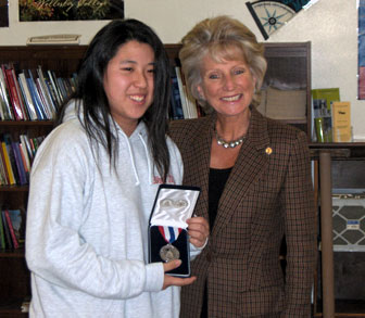 Jane Harman presents Victoria Hsieh with the Congressional Silver Medal for public Service.