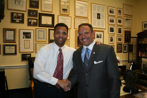 Congressman Jackson shaking hands with Marc Morial