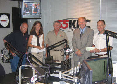 Congressman Chabot and Morning Show hosts Jerry Thomas and Craig Kopp present donations for Hurricane Katrina relief efforts