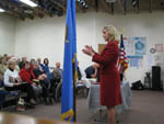 Mary speaks to Edmond residents at a town hall event