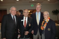 Rep. Crenshaw photographed at the Jacksonville Council of the Navy League's Annual Pearl Harbor Commemoration Luncheon.  With him are RADM Byron Fuller, RADM Joe Coleman, and Capt. Charles Gray Strum.  Capt. Strum, with the lei, was at Pearl Harbor when it was bombed.