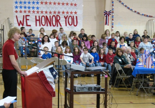 PHOTO: Tammy joins elementary students on November 25 in honoring our veterans at the 13th Annual Veteran's Breakfast held at Pardeeville Elementary School.