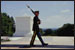 Photo, Solider walking in Arlington National Cemetery