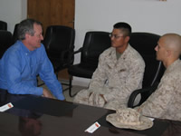 While in Iraq in June 2004, Senator Crapo meets with two Idaho soldiers deployed there.