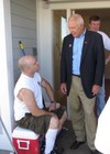 Congressman John Kline congratulates Sergeant Marcus Kuboy on his new home in Woodbury. Sergeant Kuboy's home was built by hundreds of volunteers as part of the 