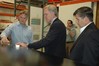 Rep. Crenshaw reviews a new project at Goodrich, which produces advanced composite components for the U.S. Navy.
