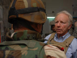 Senator Lieberman speaks with a soldier on his lastest trip to Iraq.