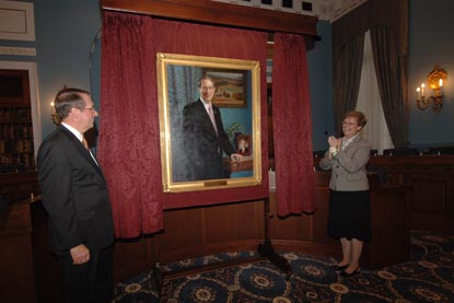 Picture: Maryellen Goodlatte, Rep. Goodlatte's wife of 33 years, pulls the curtain unveiling the Chairman's portrait which will be hung in the Agriculture Committee Hearing room. (September 25, 2007) 