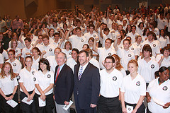Picture of Senator Harkin with David Eisner, Chief Executive Officer of the Corporation for National and Community Service, and with members of the NCCC class from Vinton