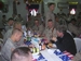 While visiting the city of Fallujah in Iraq, Senator Coleman had lunch with members of the Minnesota National Guard. 