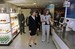 Carrie Johnson takes Sen. Dole on a tour of IBM'S Retail Innovation Center. 