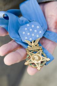 Medal of Honor Recipient Tibor Rubin displays his medal. (Credit: Roger Sherman)