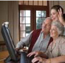 A family at their home computer