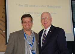 Leahy is pictured with Ken Rutherford, Ph.D., who is a double amputee as a result of a landmine accident in Somalia.