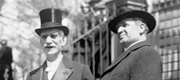 In a rare photograph showing House Chaplains, Henry Couden (who served from 1895 to 1921; at left) and Chaplain James Montgomery (1921-1950; at right) stand outside the White House in 1921. Couden was the first and only blind Chaplain of the House of Representatives.