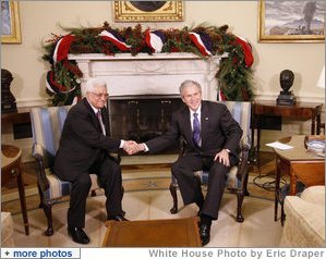 President George W. Bush welcomes President Mahmoud Abbas of the Palestinian Authority Friday, Dec. 19, 2008, to the Oval Office of the White House. White House photo by Eric Draper