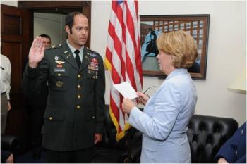 Tsongas reads oath for CW4 John Saalfrank from Andover at his Promotion Ceremony in Washington DC