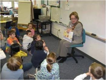 Niki reads to students at the Community Reading Day at the SwallowUnion ElementarySchool in Dunstable