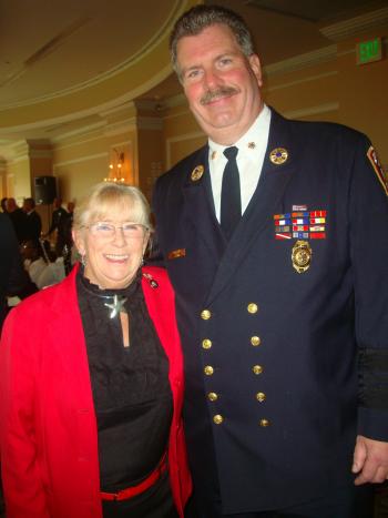 Congresswoman McCarthy is Pictured with Freeport Fireman Ray Maguire at the U.S.M.C. Annual Toys for Tots Fundraising Event