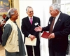 Senator Enzi (right) speaks with Dr. Muhammad Yunus (left)