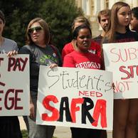 Students show their support for the Student Aid and Fiscal Responsibility Act.