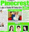 Ros-Lehtinen with Secretary of State Clinton holding a Pinecrest Tribune. 