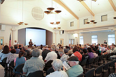 Constituents look on as Rep. Honda answers a question - August 2010 Cupertino Town Hall by congressman_honda