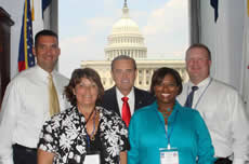 Four staff members from Alton Middle School meet with Congressman Costello in his Washington, D.C. office.