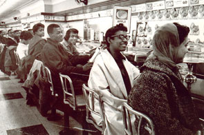 African-American demonstrators occupied a lunch counter after being refused service in Nashville, Tennessee, in 1960. Sit-ins like this one took a toll on segregated businesses across the South. Many establishments relented and ended segregation practices because of the ensuing loss of business.