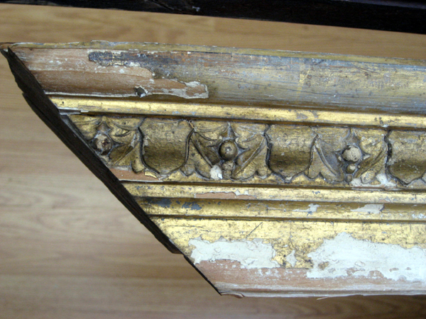 Areas of the gilded interliner needed to be repaired and water gilded.