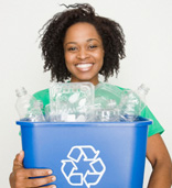 girl recycling bottles
