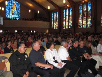 About 800 residents filled St. Roberts Church