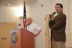 Rep. Mike Honda and Moderator look on as a constituent asks a question - August 2010 Cupertino Town Hall by congressman_honda