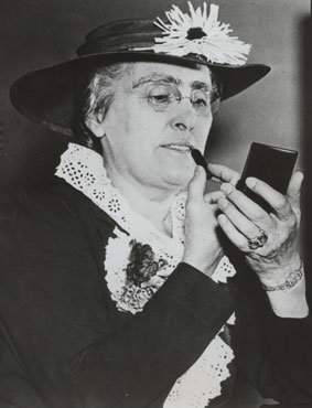 Virginia Jenckes Applying Lipstick, 1936