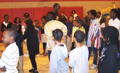 Rams Super Bowl Hero Isaac Bruce inspires Cote Brilliante students at Congressman Clay's Let's Move/Healthy Eating Event