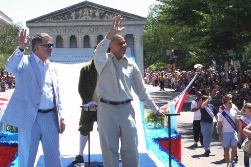 Archivist of the United States David Ferriero and Congressman Clay greet thousands of Independence Day parade attendees along Constitution Avenue