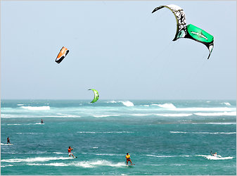 iteboarding at Kite Beach, near Cabarete, Dominican Republic. First-timers start with a training kite on the beach.