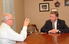 Congressman Rogers speaks with Military Veteran David Posey.