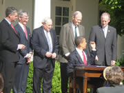 5-22-09 During a ceremony in the White House Rose Garden, President Barack Obama gives House Armed Services Committee Chairman Ike Skelton a pen which was used to sign into law S. 454, the Weapon Systems Acquisition Reform Act of 2009.