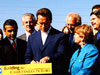 Rep. Howard Berman watches as Gov. Schwarzenegger signs a bill that would facilitate the construction of an HOV lane on the northbound 405 Freeway.   This legislation helps make sure that California will receive the $130 million in federal funds for this project obtained by Rep. Berman in the Surface Transportation Reauthorization bill.