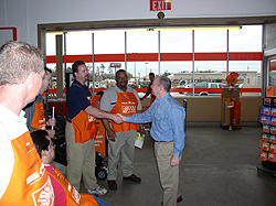 Employees at the new Home Depot in Conroe greet Congressman Brady during a tour.