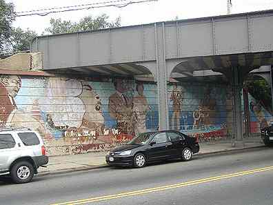 This now-fading mural on the northern side of Linden Boulevard as it passes under the Long Island Railroad depicts many of the jazz and entertainment giants who    resided here