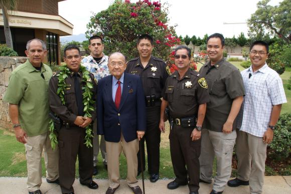 Senator Inouye attends a ceremony for new Hawaii Deputy Sheriff recruits.