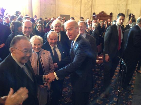 Senator Inouye shares a laugh with Vice President Joe Biden at a ceremony honoring the late Senator Warren Rudman.