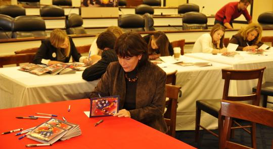 Congresswoman McCollum Signs Holiday Cards for Service Members, Veterans, and Families feature image